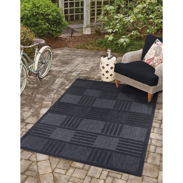 Ebern Designs Fatinah Power Loom Polypropylene Indoor/Outdoor Black Rug Wayfair.co.uk